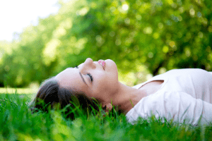 woman lying in grass