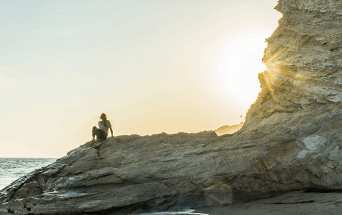 woman on rock be still