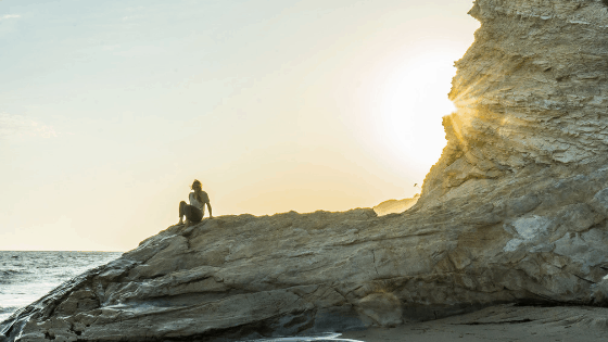 woman on rock be still